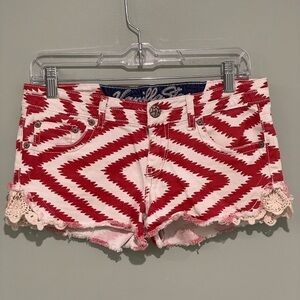 Vanilla Star Aztec red and white “booty shorts” with cute crochet side detail